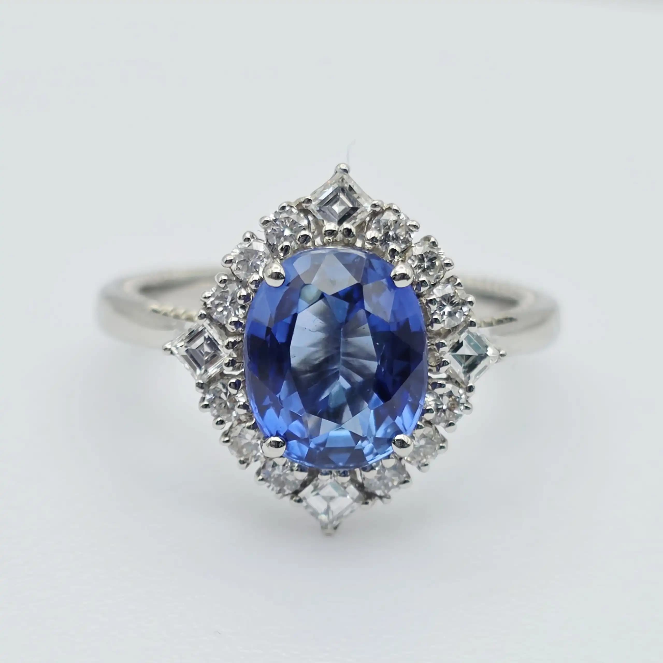 Vintage Style Blue Sapphire and Diamond Halo Ring