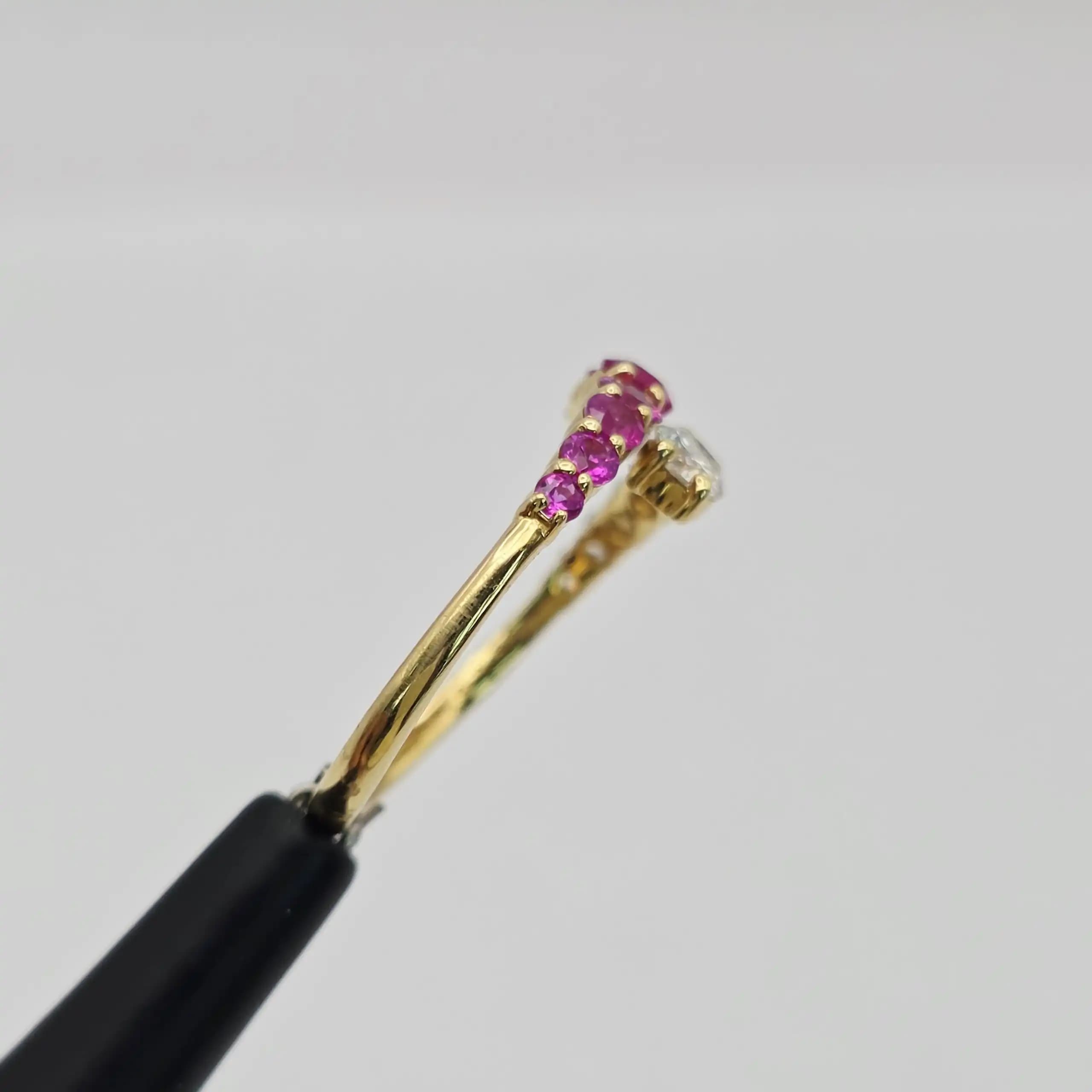 0.59 cts emerald cut natural ruby and diamond band ring in 18K yellow gold