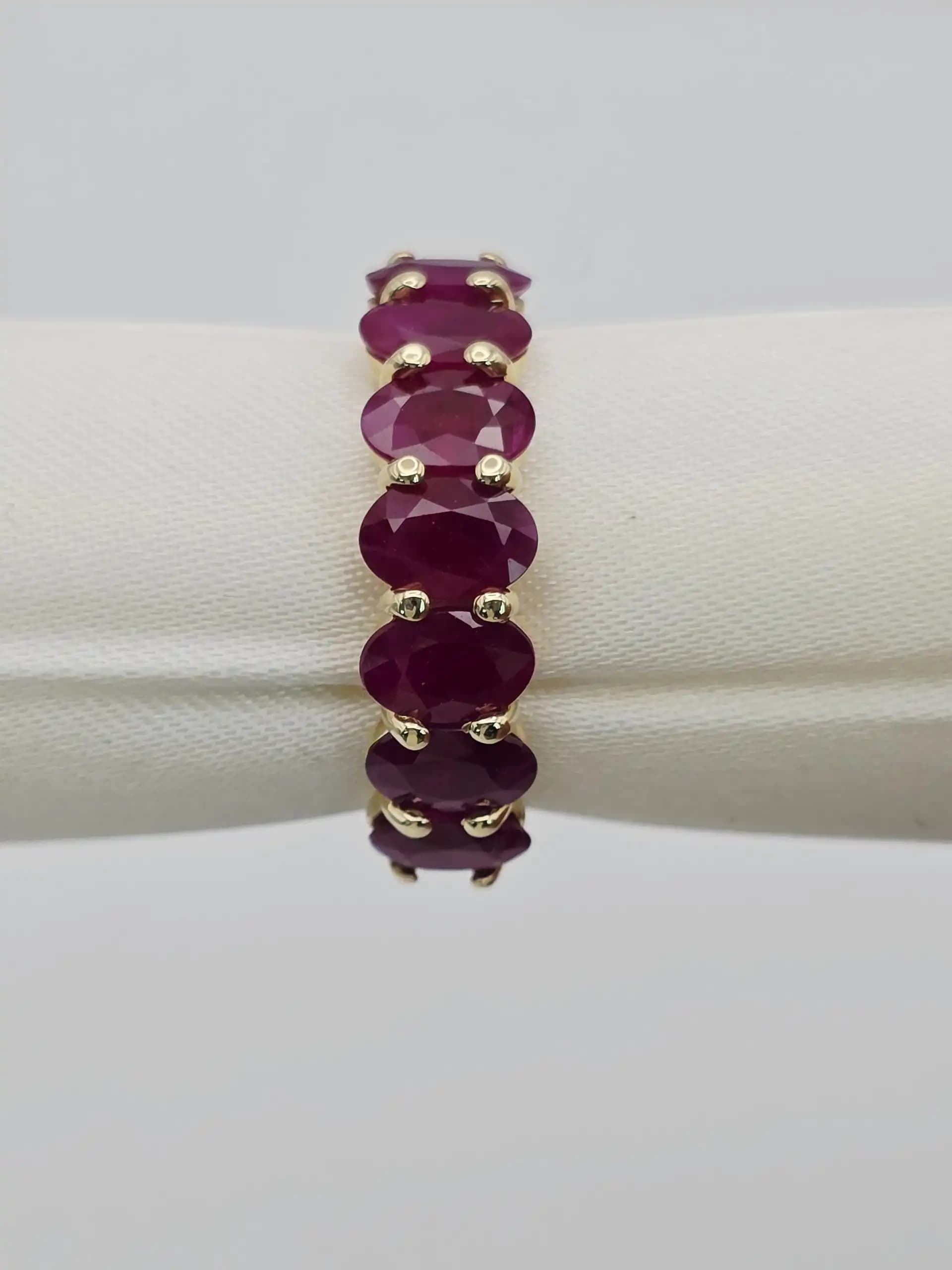 3.58 cts oval natural ruby half eternity ring in 14K yellow gold