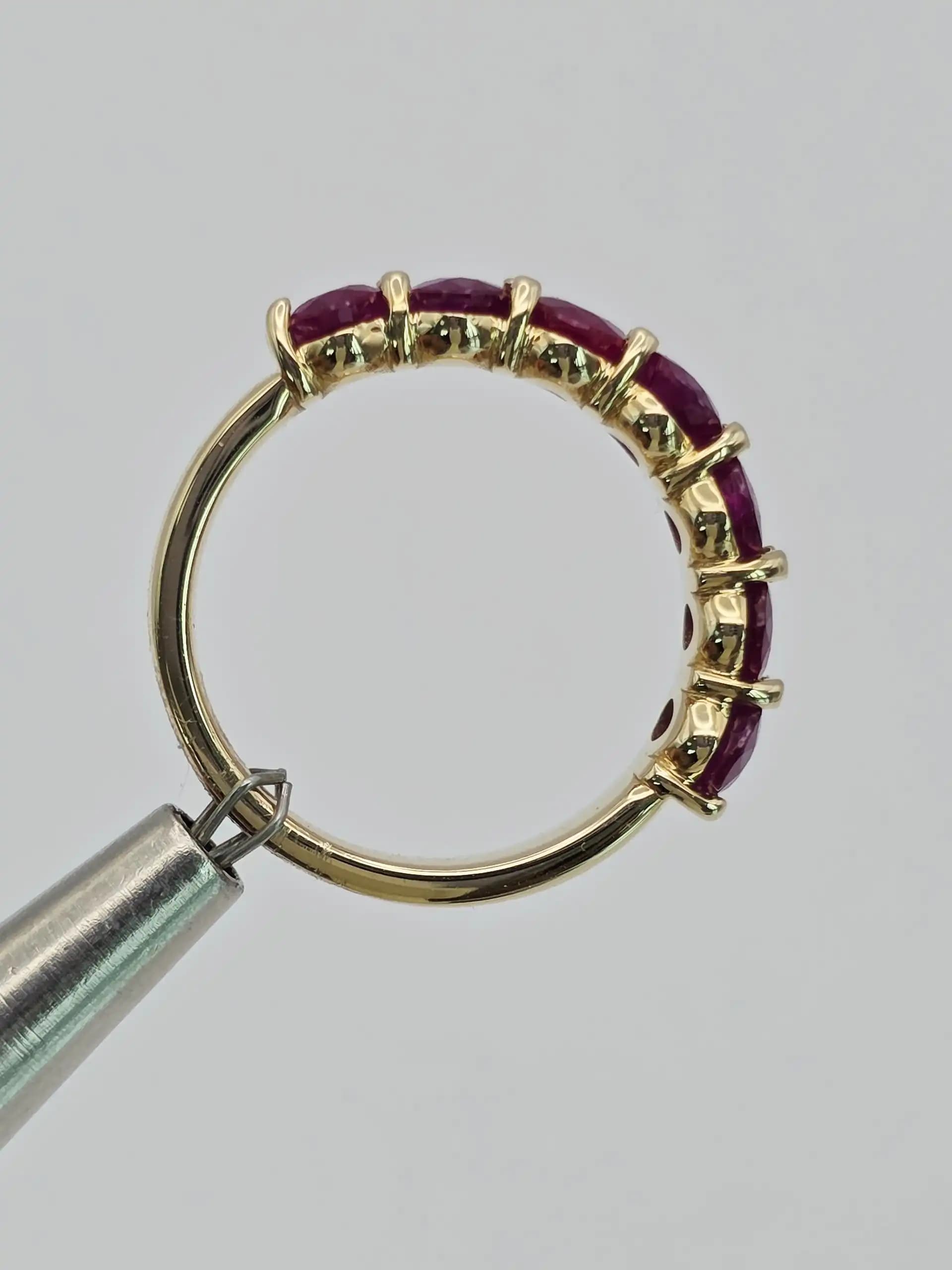 3.58 cts oval natural ruby half eternity ring in 14K yellow gold