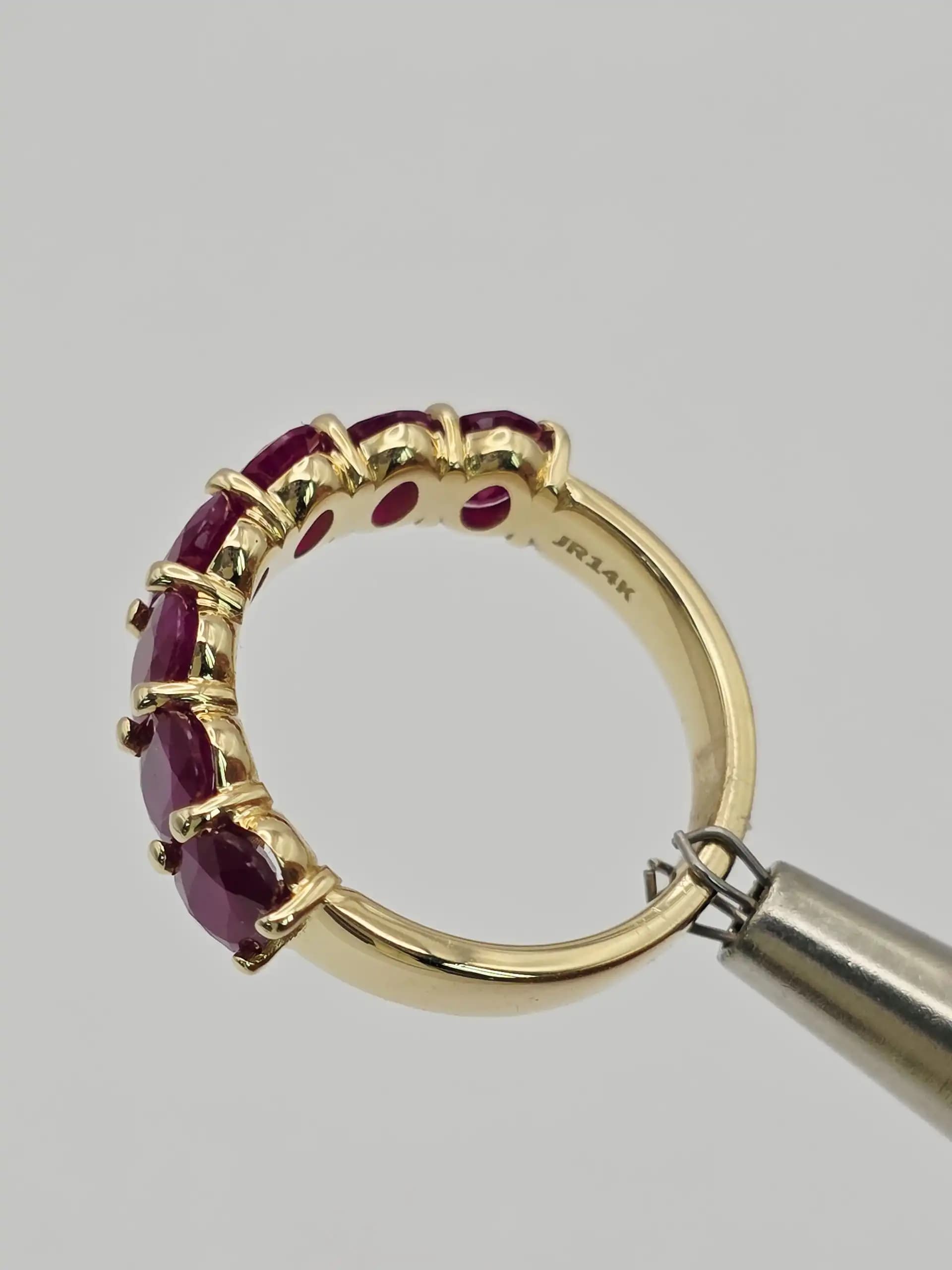 3.58 cts oval natural ruby half eternity ring in 14K yellow gold
