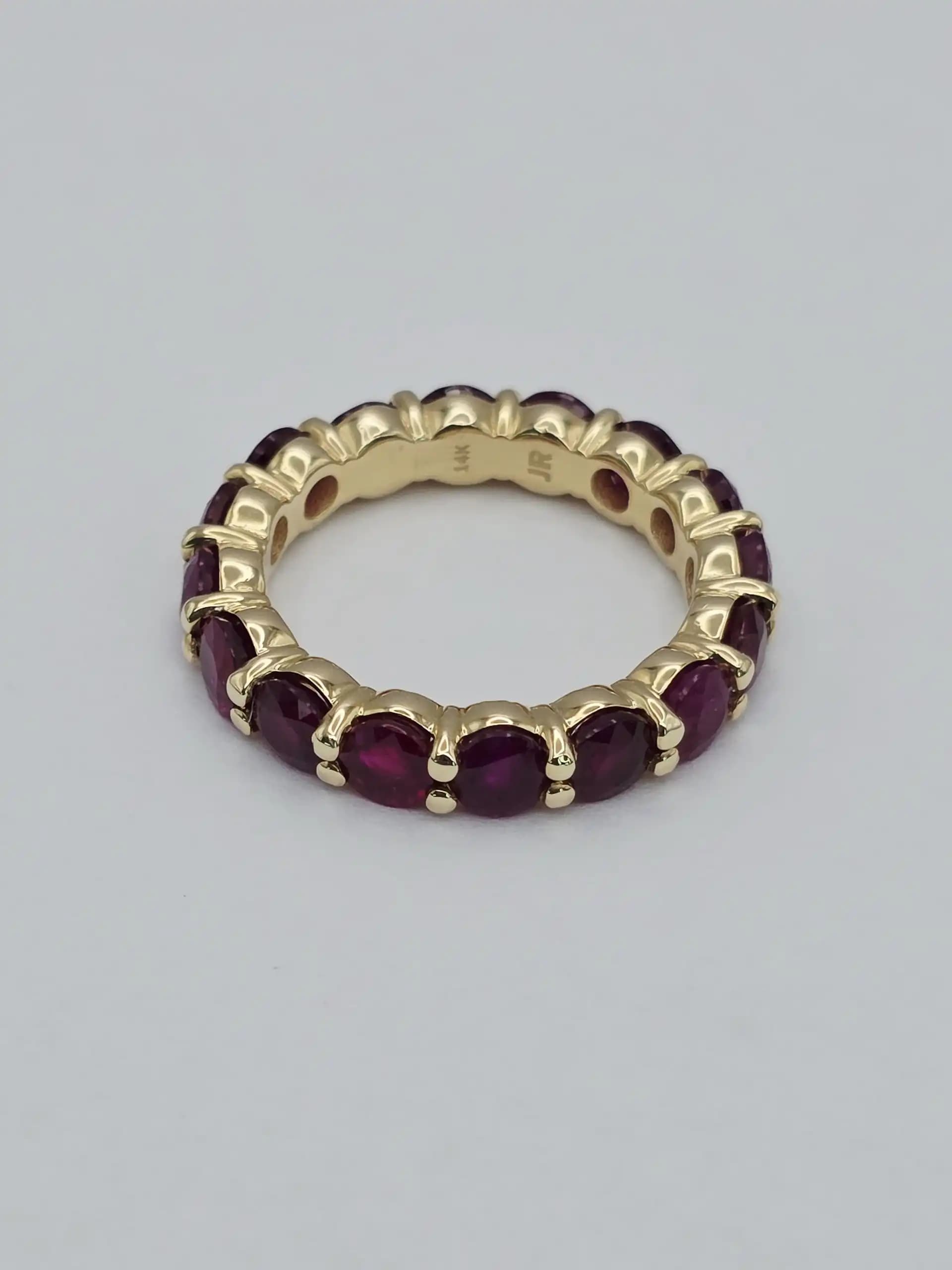 5.10 cts emerald cut natural ruby and diamond eternity ring in 14K white gold