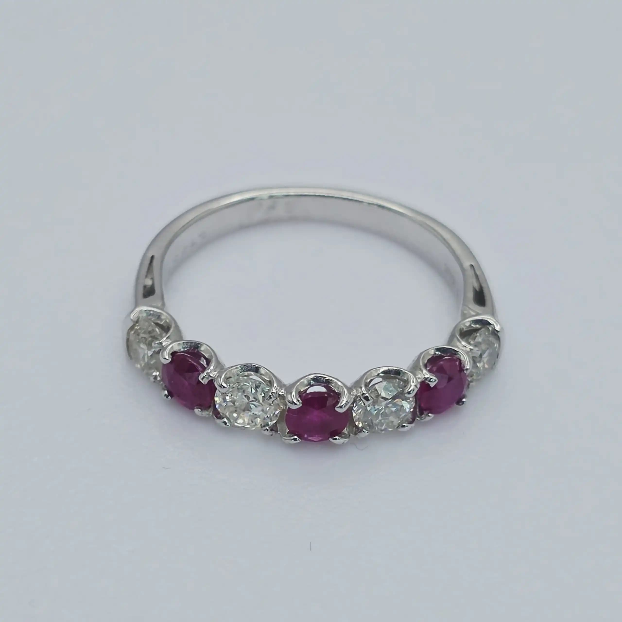 0.63 cts natural ruby and diamond band ring in 18K white gold