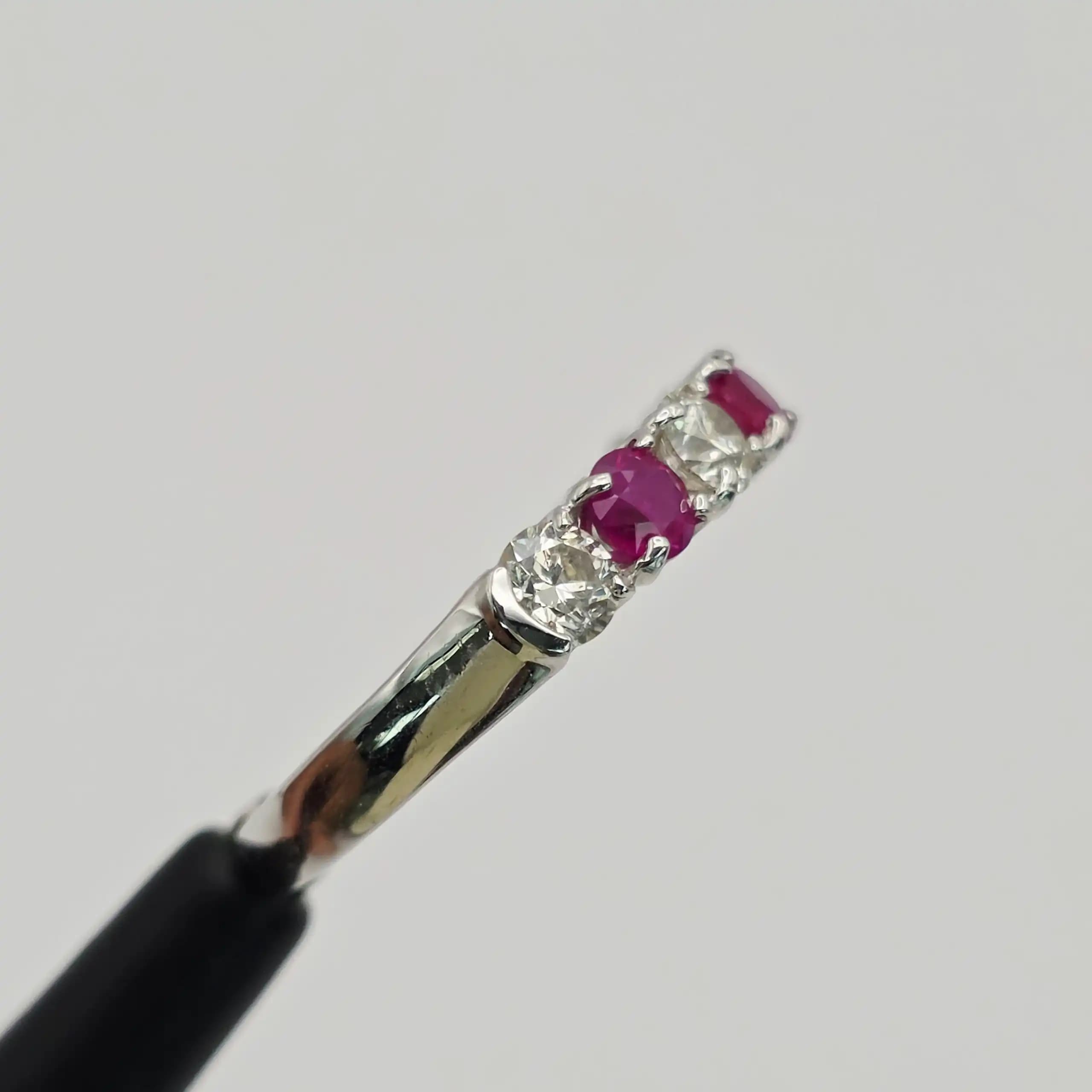0.63 cts natural ruby and diamond band ring in 18K white gold