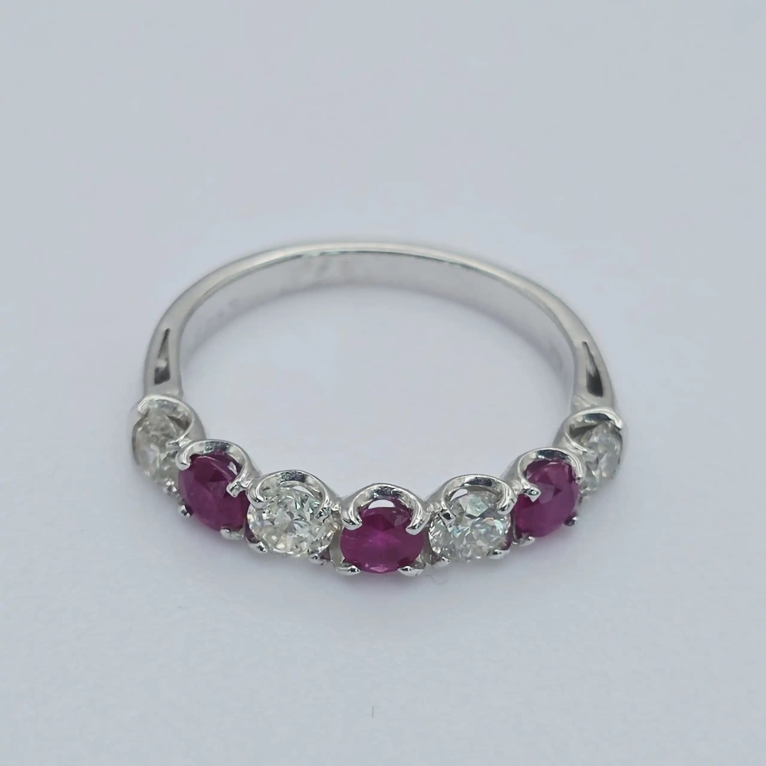 0.63 cts natural ruby and diamond band ring in 18K white gold