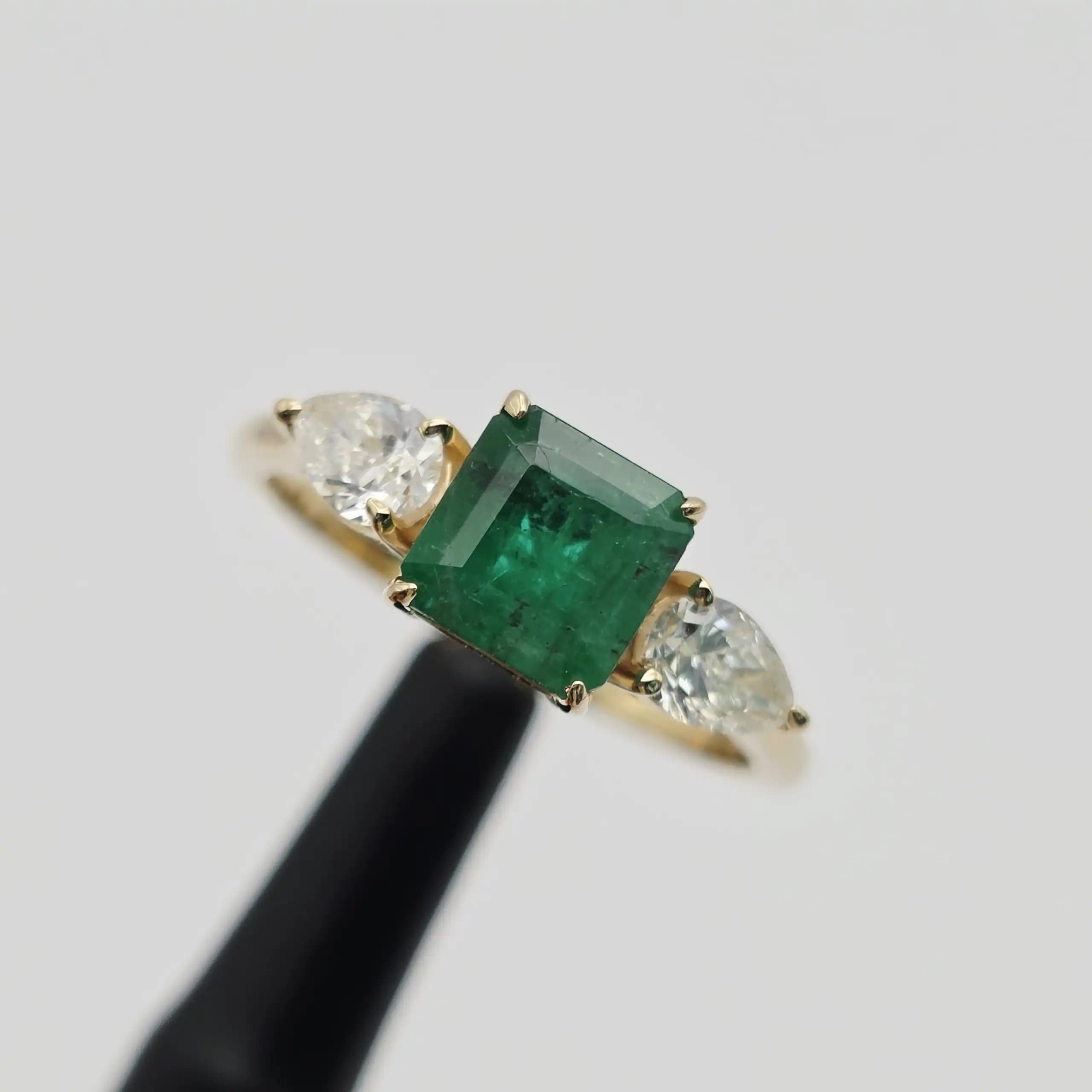 1.23 cts oval natural emerald solitaire ring with pave band in 14K yellow gold