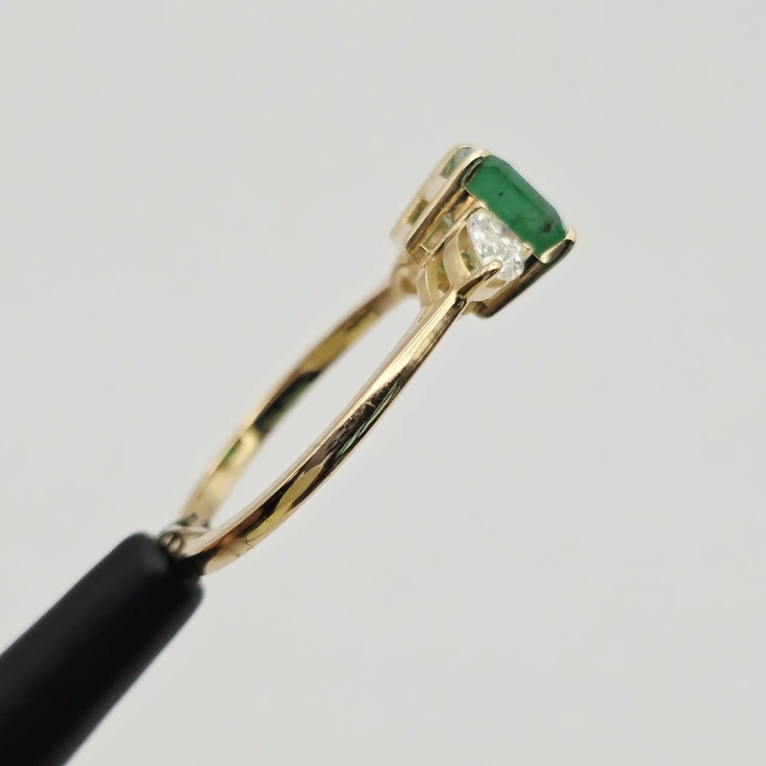 1.23 cts oval natural emerald solitaire ring with pave band in 14K yellow gold