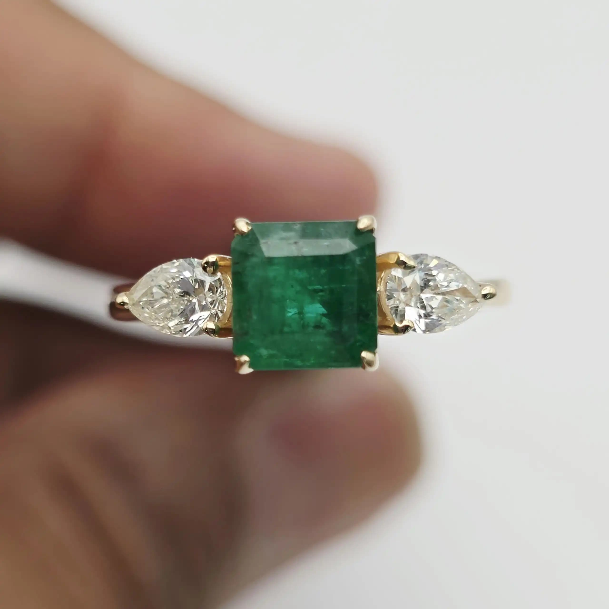 1.23 cts oval natural emerald solitaire ring with pave band in 14K yellow gold