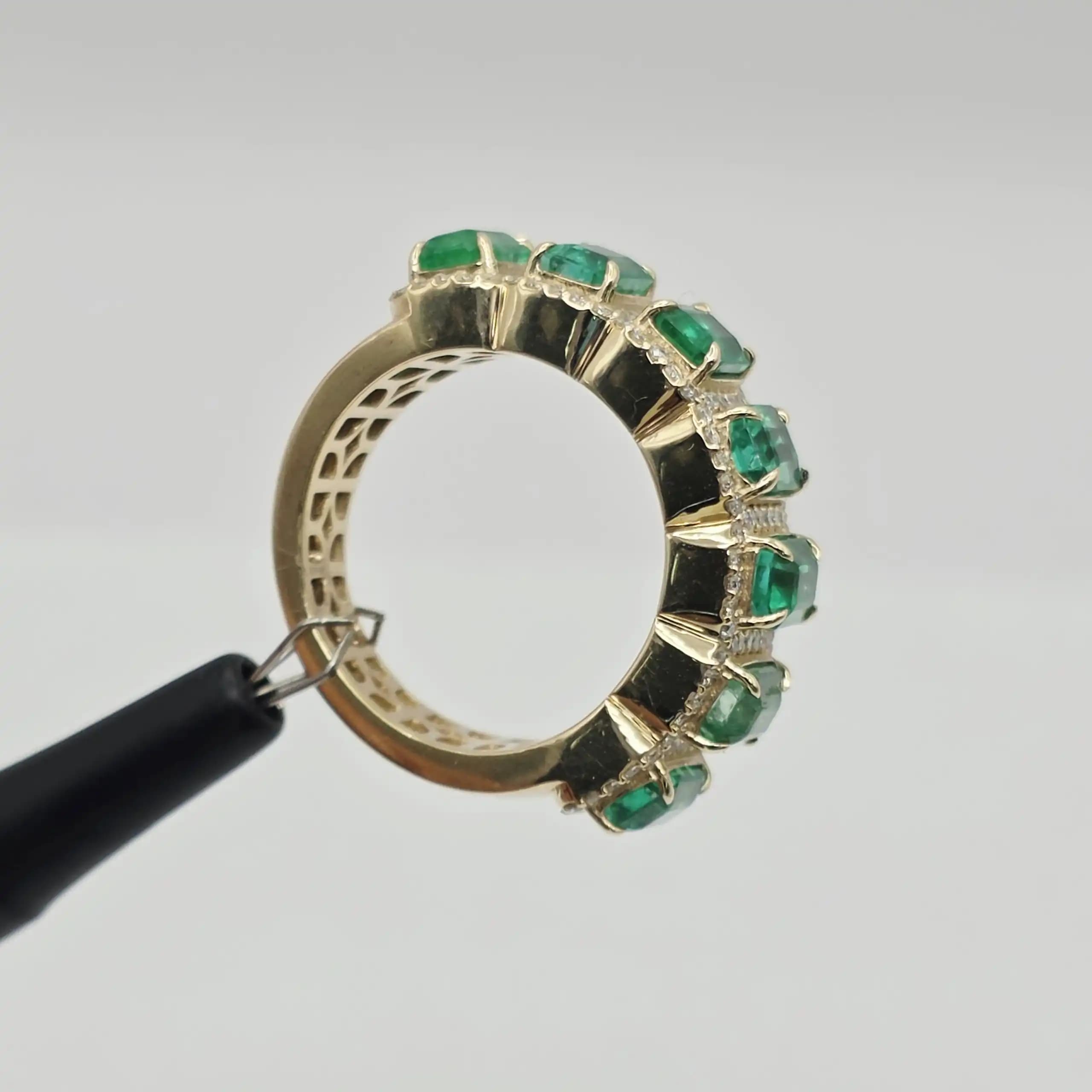 3.68 cts emerald cut natural emerald half eternity ring in 14K yellow gold