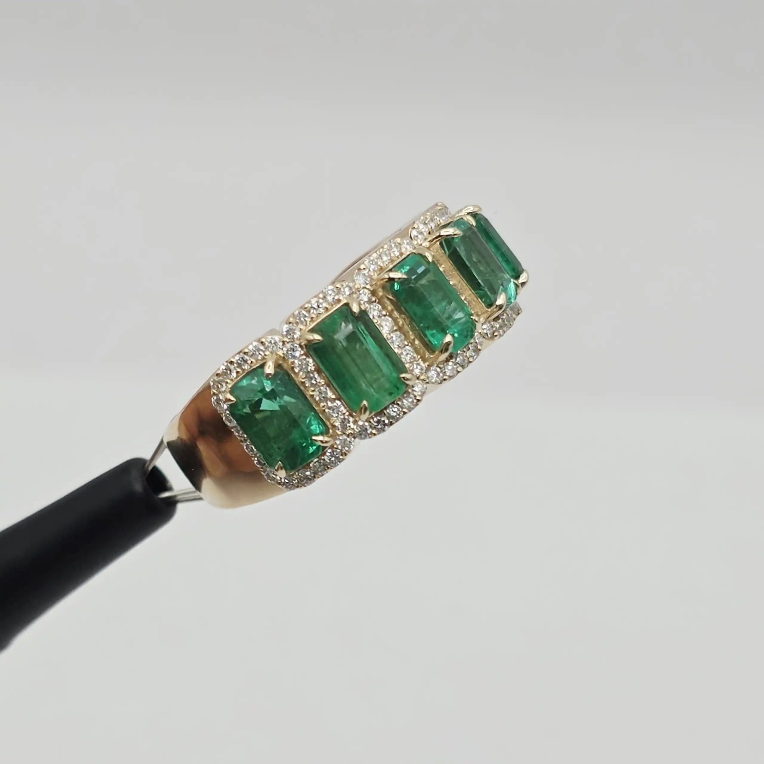 3.68 cts emerald cut natural emerald half eternity ring in 14K yellow gold