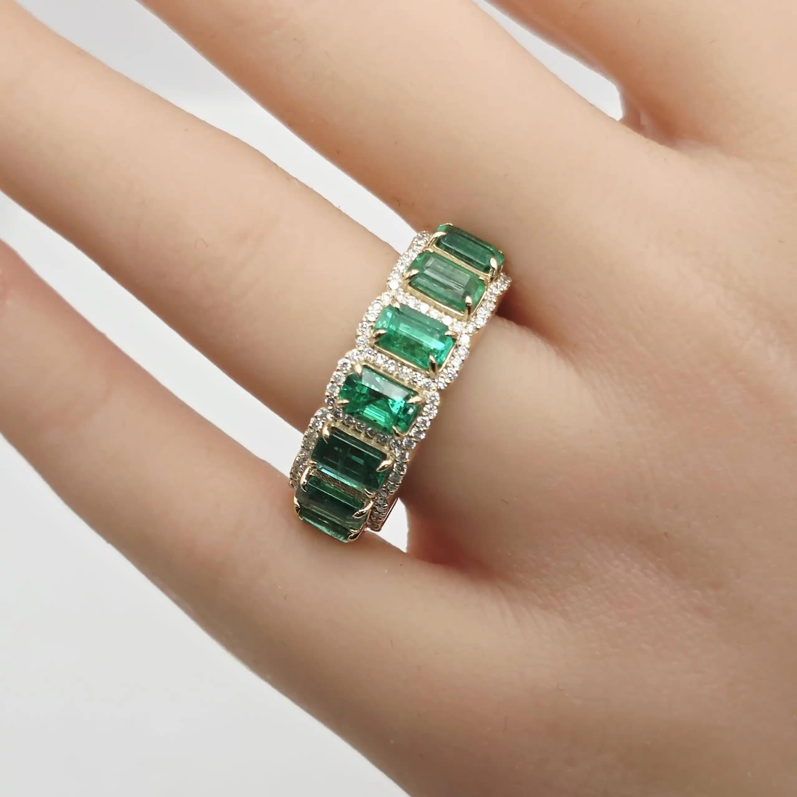 3.68 cts emerald cut natural emerald half eternity ring in 14K yellow gold