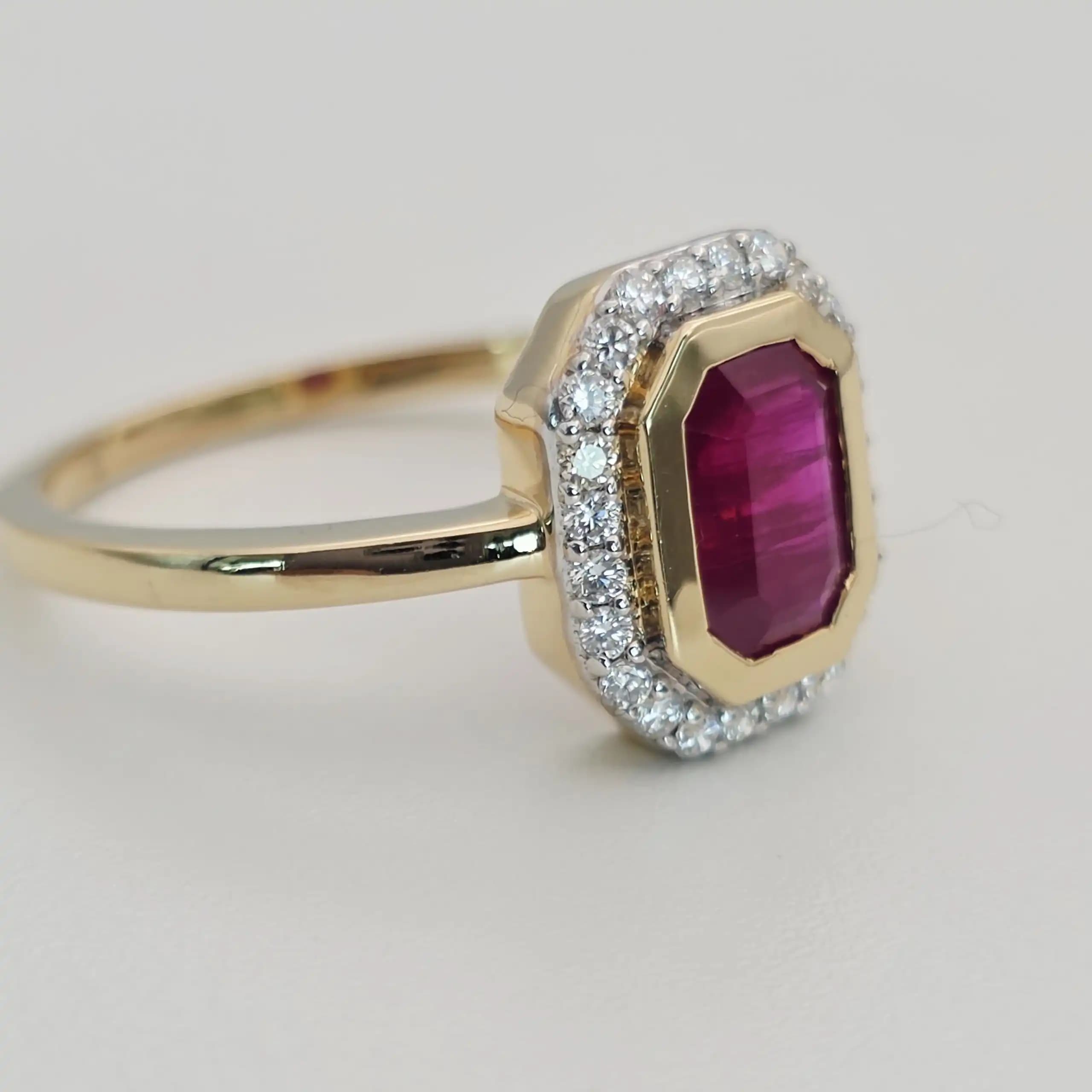 1.11 cts emerald cut natural ruby halo ring in 18K yellow gold