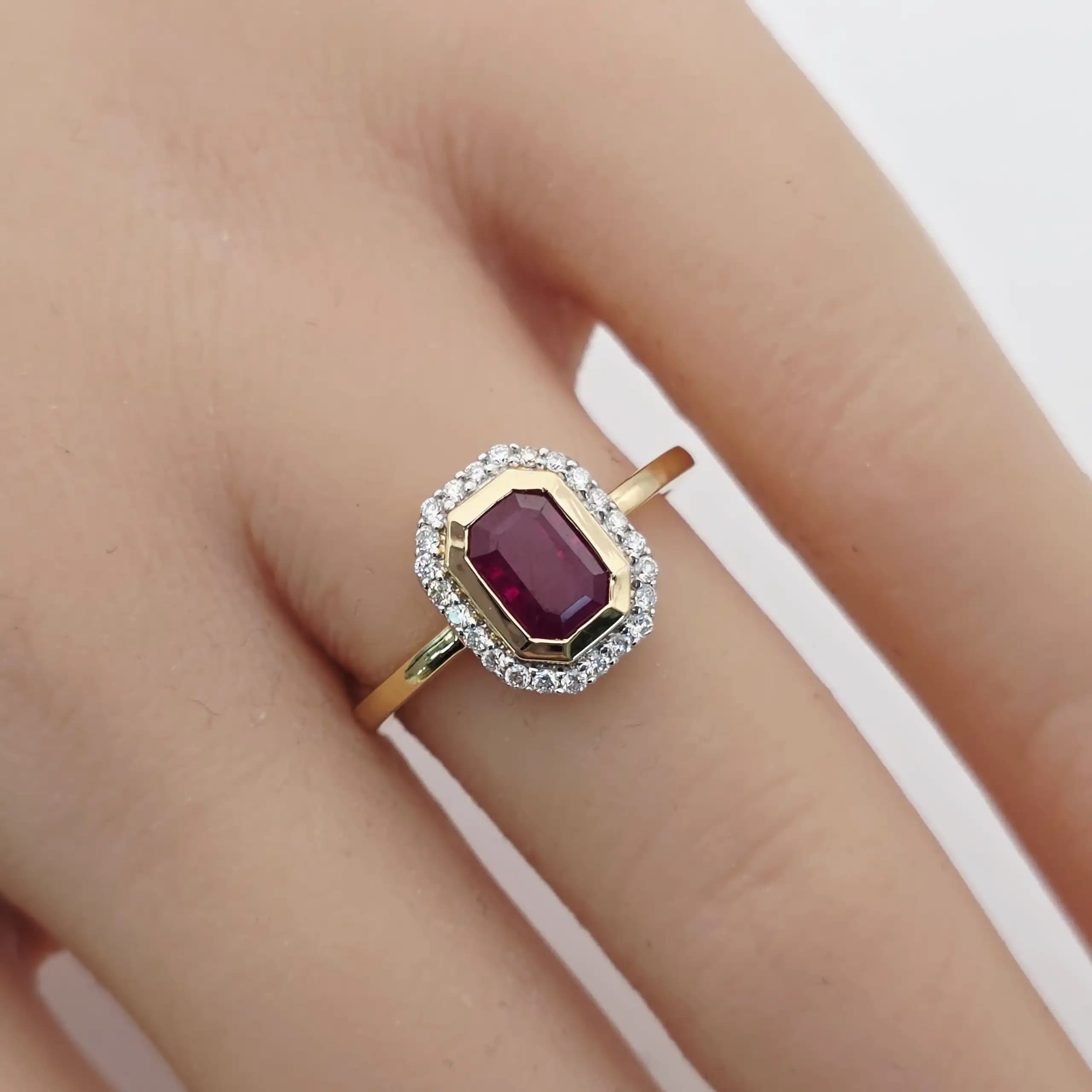 1.11 cts emerald cut natural ruby halo ring in 18K yellow gold