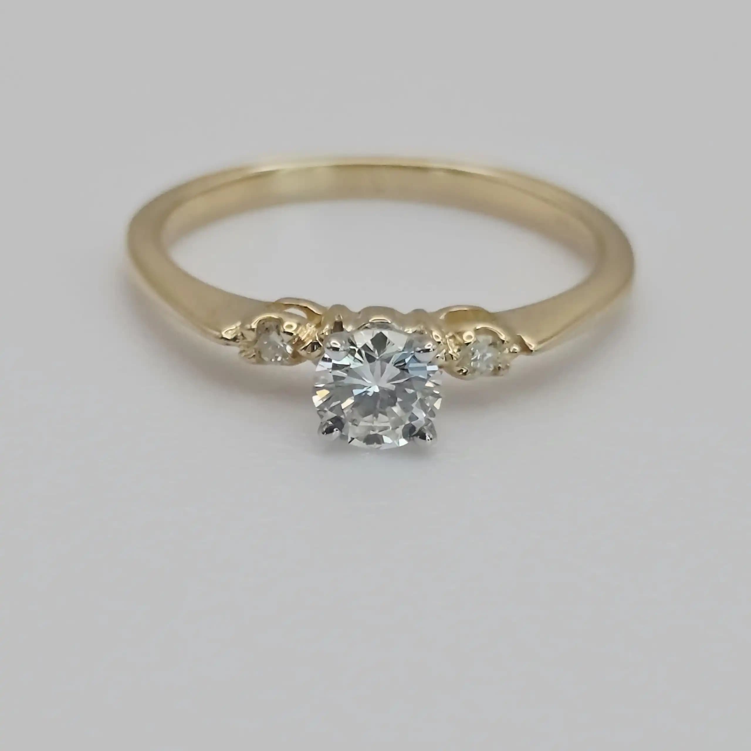 0.63 cts round natural diamond solitaire ring in 14K two tone gold
