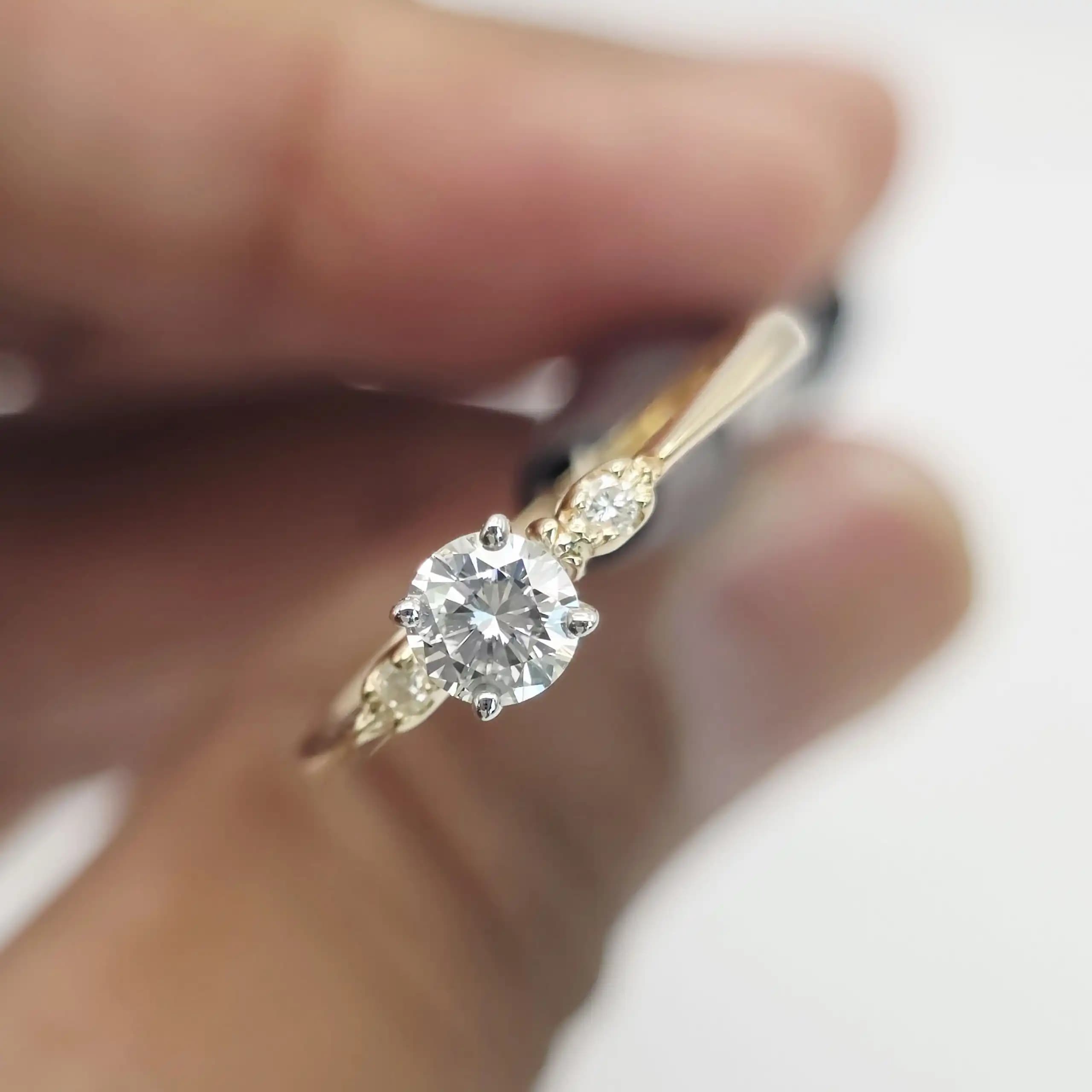 0.63 cts round natural diamond solitaire ring in 14K two tone gold