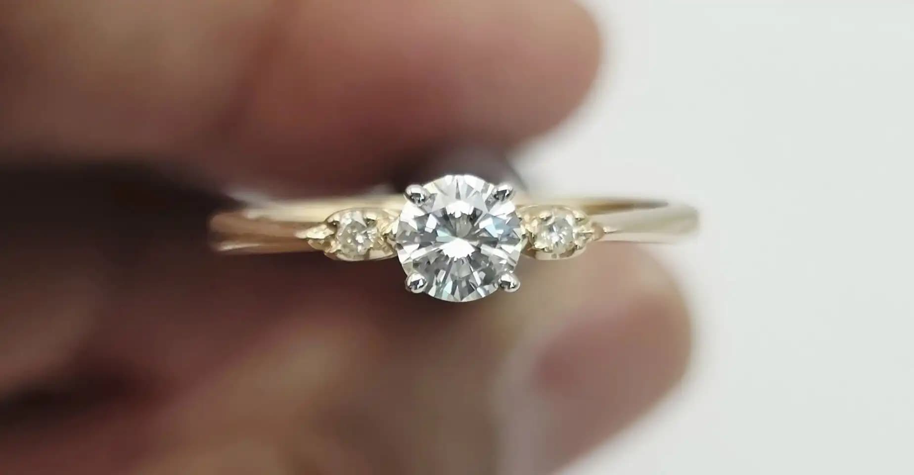 0.63 cts round natural diamond solitaire ring in 14K two tone gold