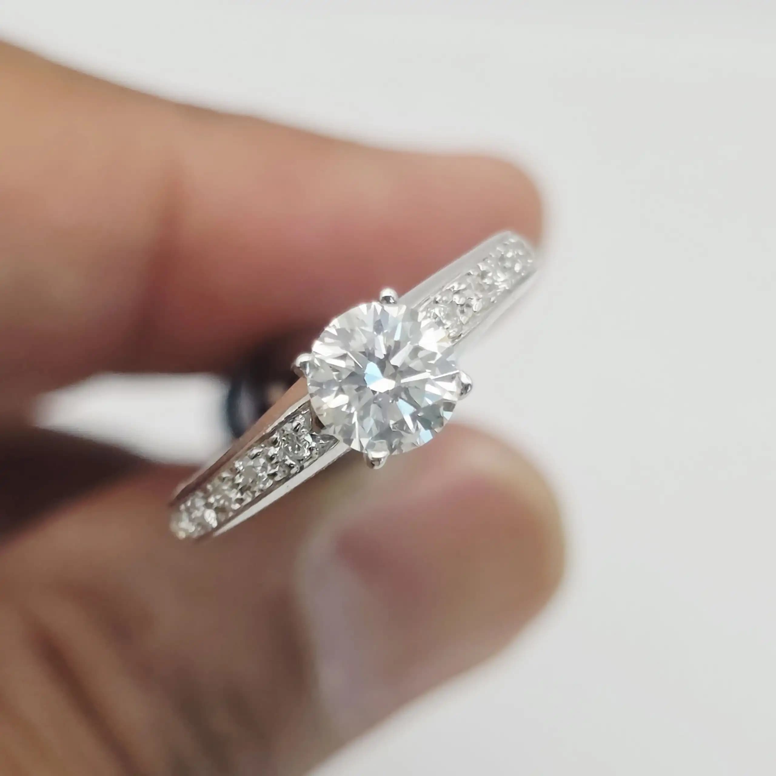 0.70 cts round natural diamond solitaire ring with pave shoulders in 14K white gold