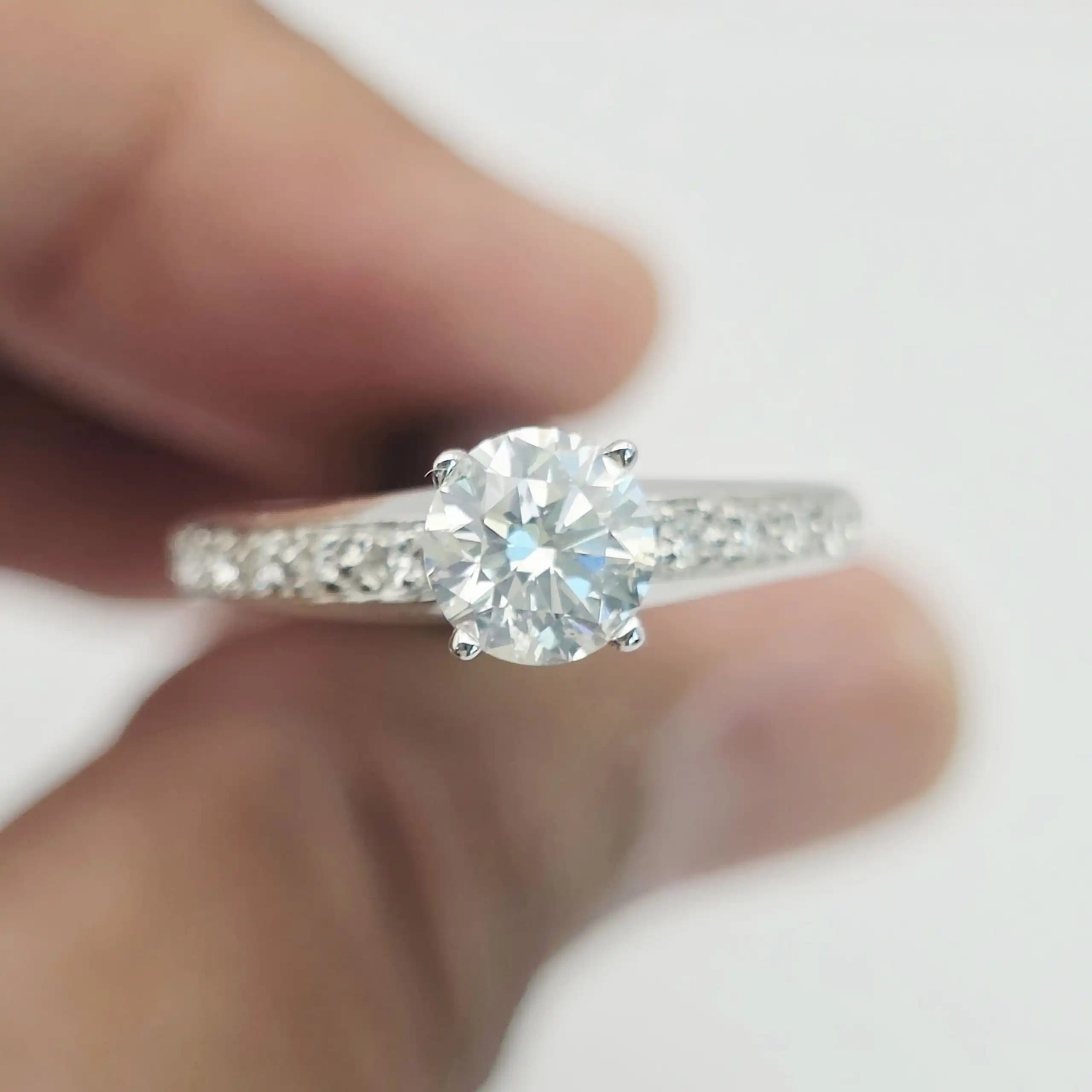 0.70 cts round natural diamond solitaire ring with pave shoulders in 14K white gold