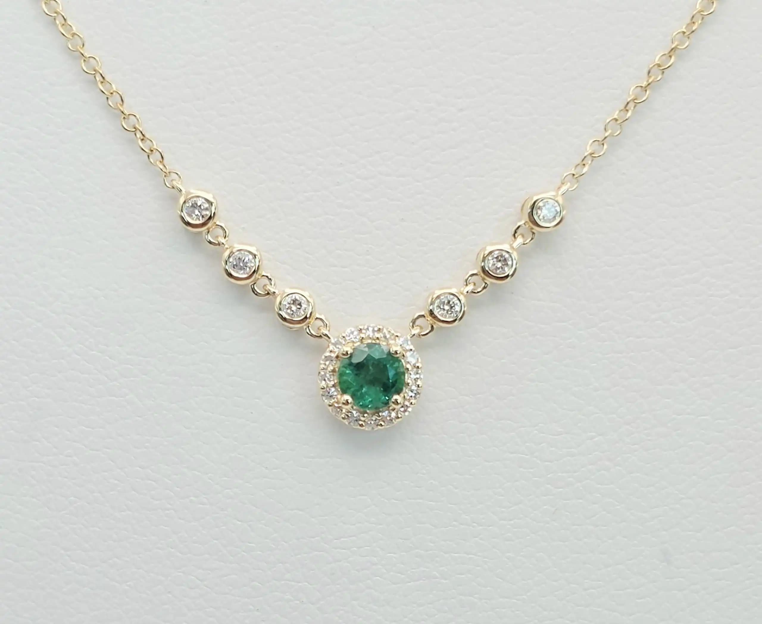 0.08 cts natural emerald and diamond curved bar necklace in 14K yellow gold