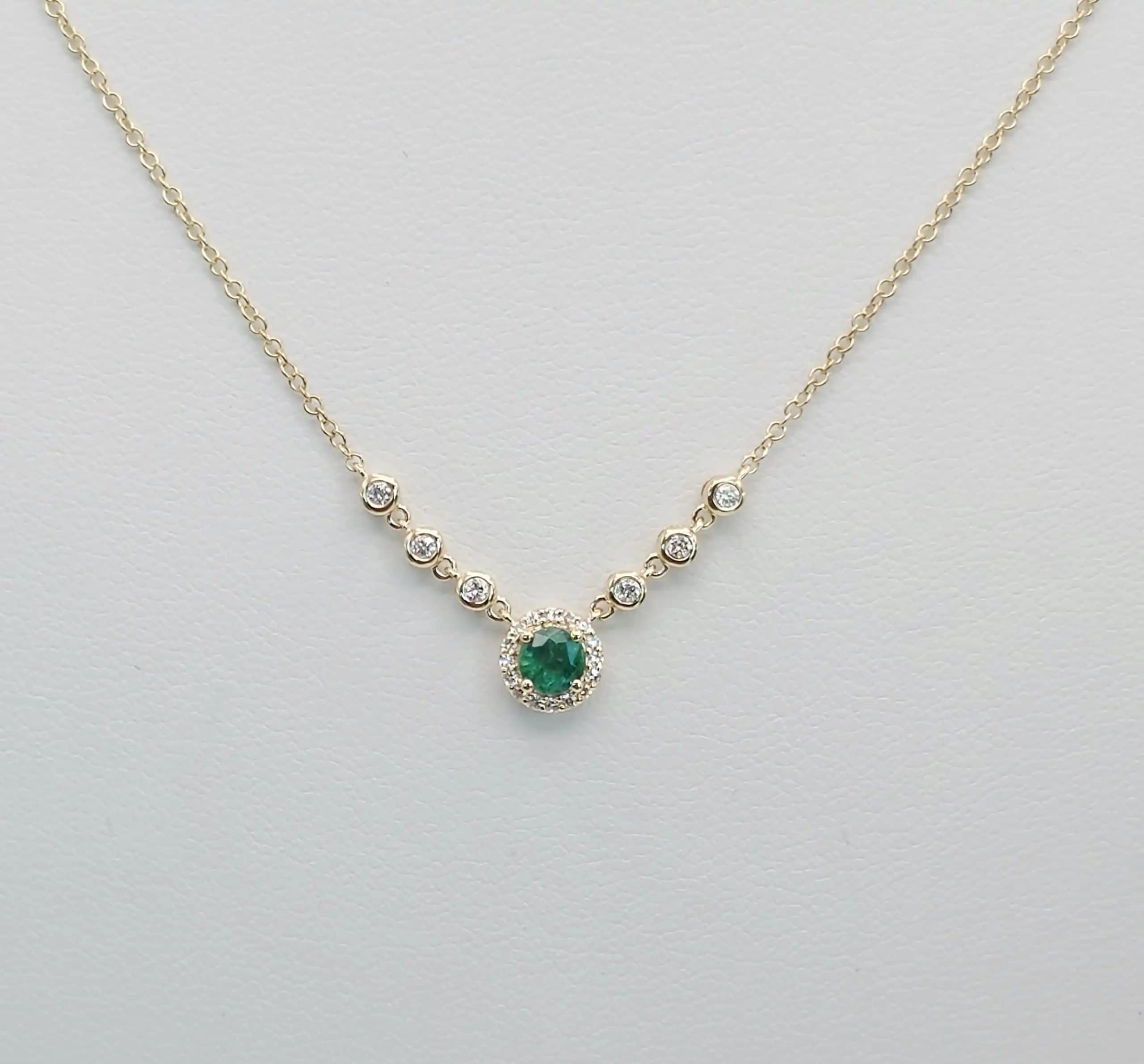 0.08 cts natural emerald and diamond curved bar necklace in 14K yellow gold
