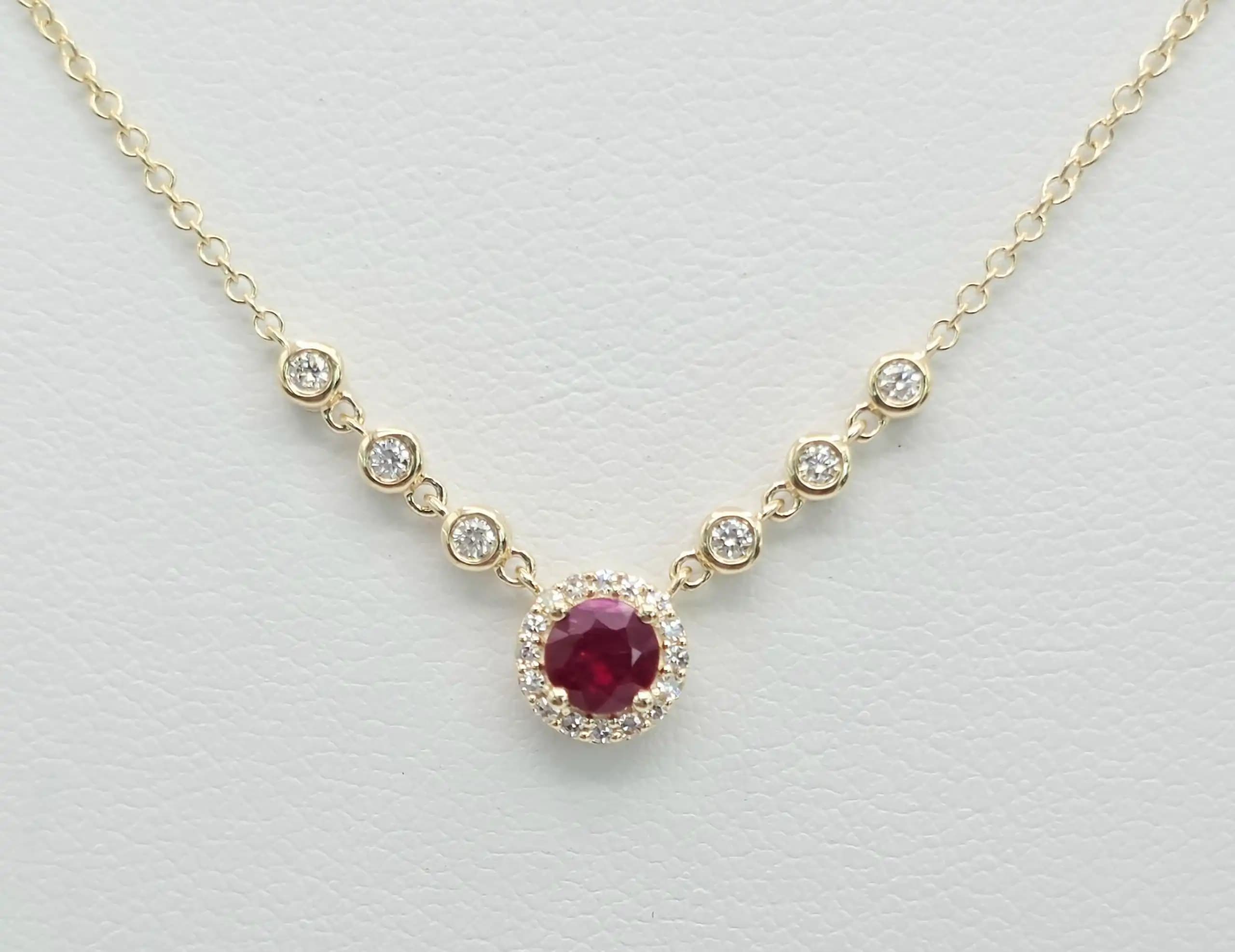 0.05 cts natural ruby and diamond halo necklace in 14K yellow gold