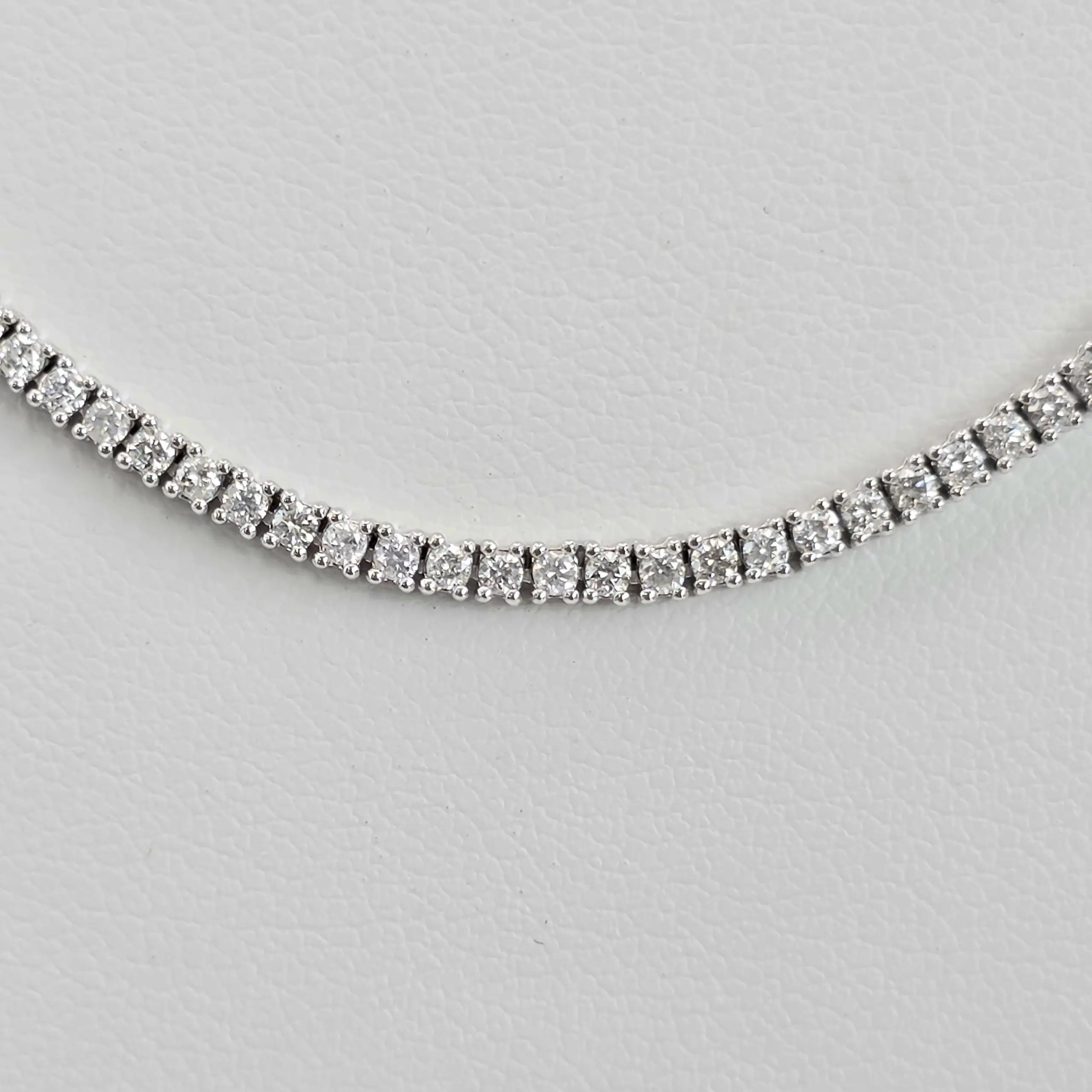 Round natural diamond graduated tennis necklace in 14K white gold