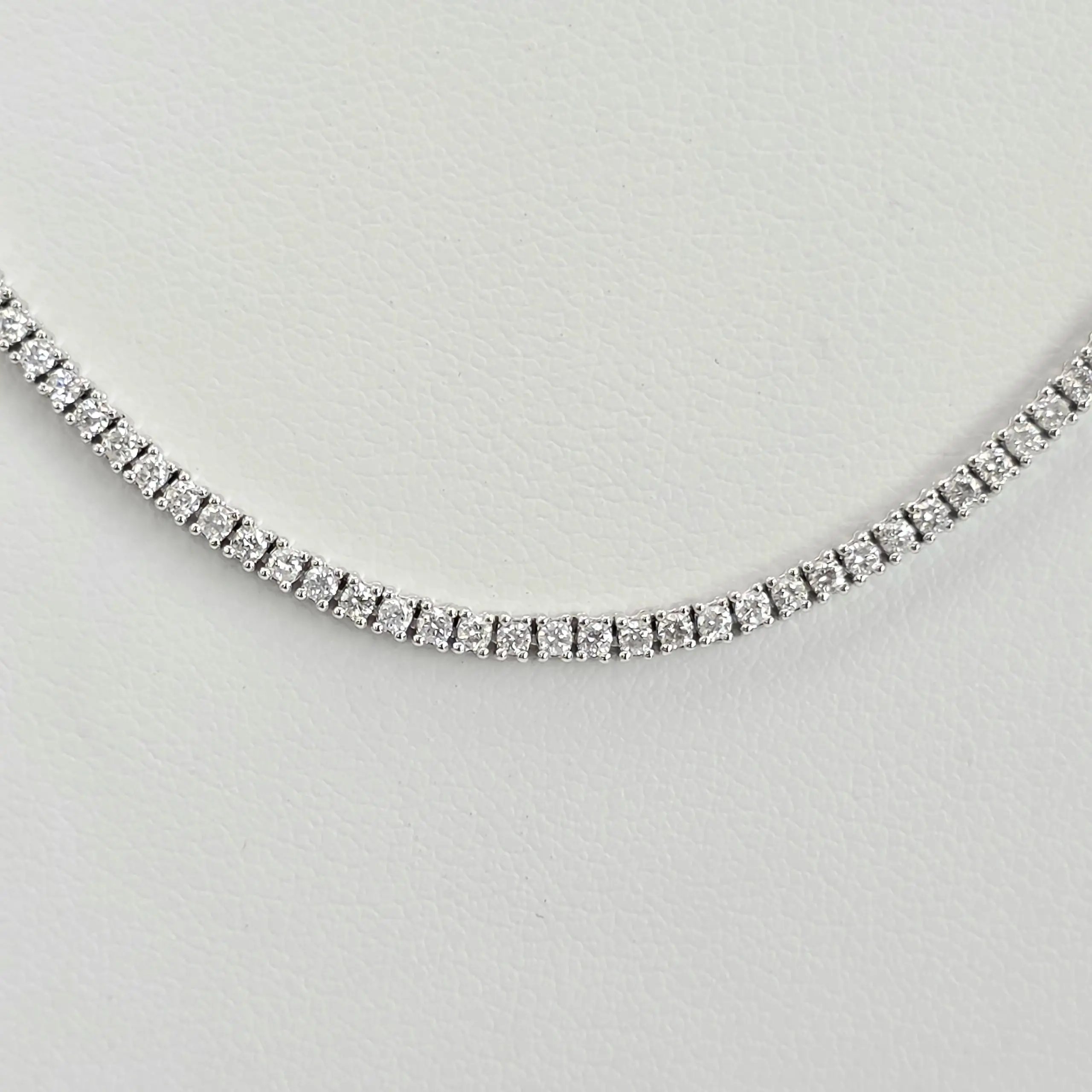 Round natural diamond graduated tennis necklace in 14K white gold
